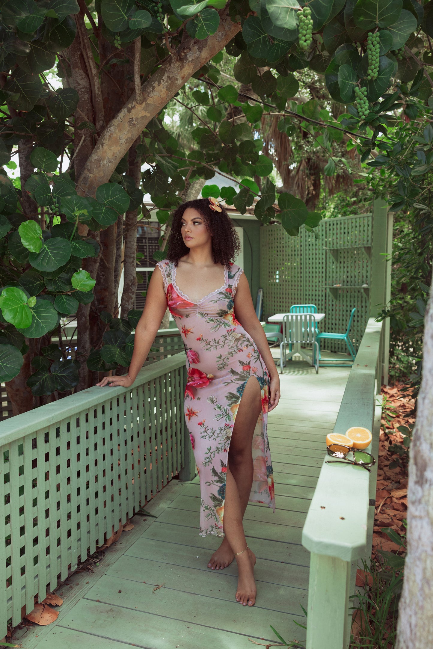 Woman in mesh floral slip dress