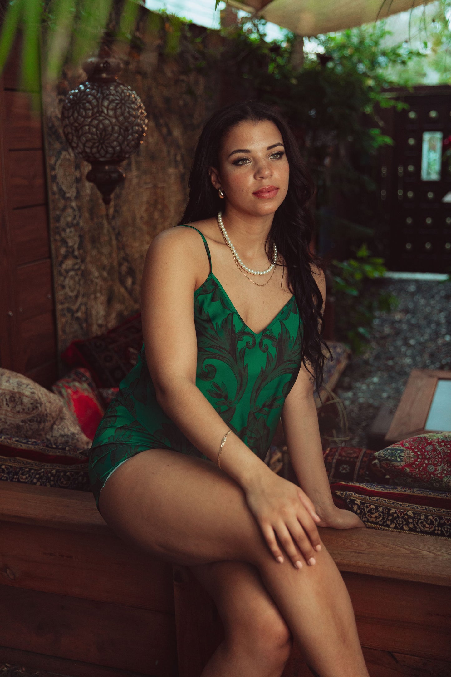 WOMAN IN GREEN CAMI SET