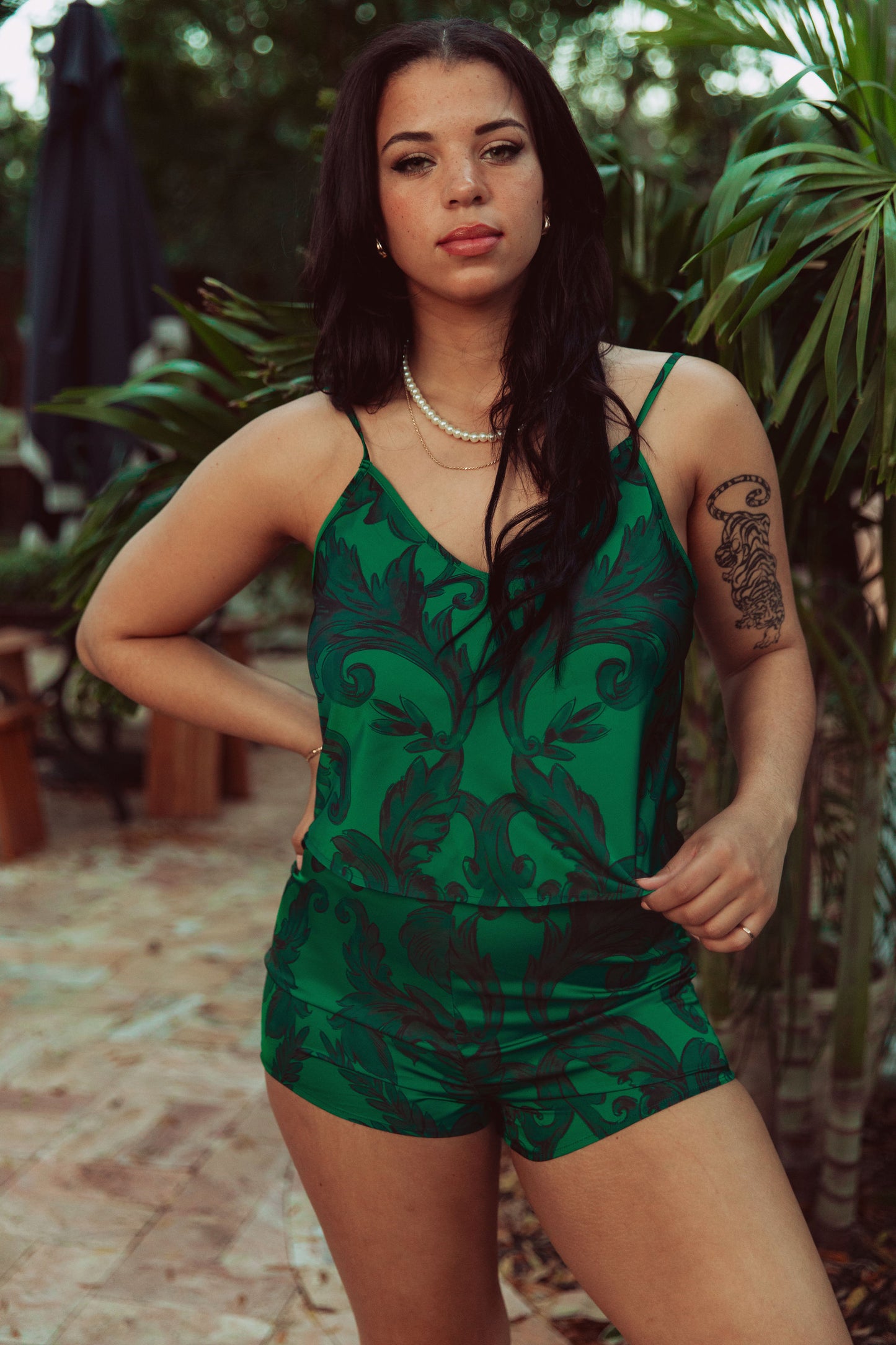 WOMAN IN GREEN CAMI SET