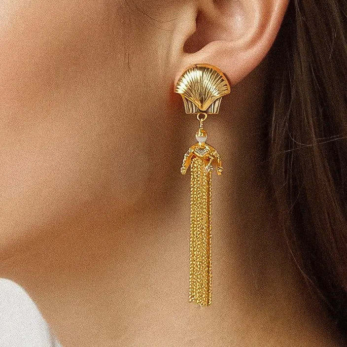 WOMAN WEARING EARRINGS
