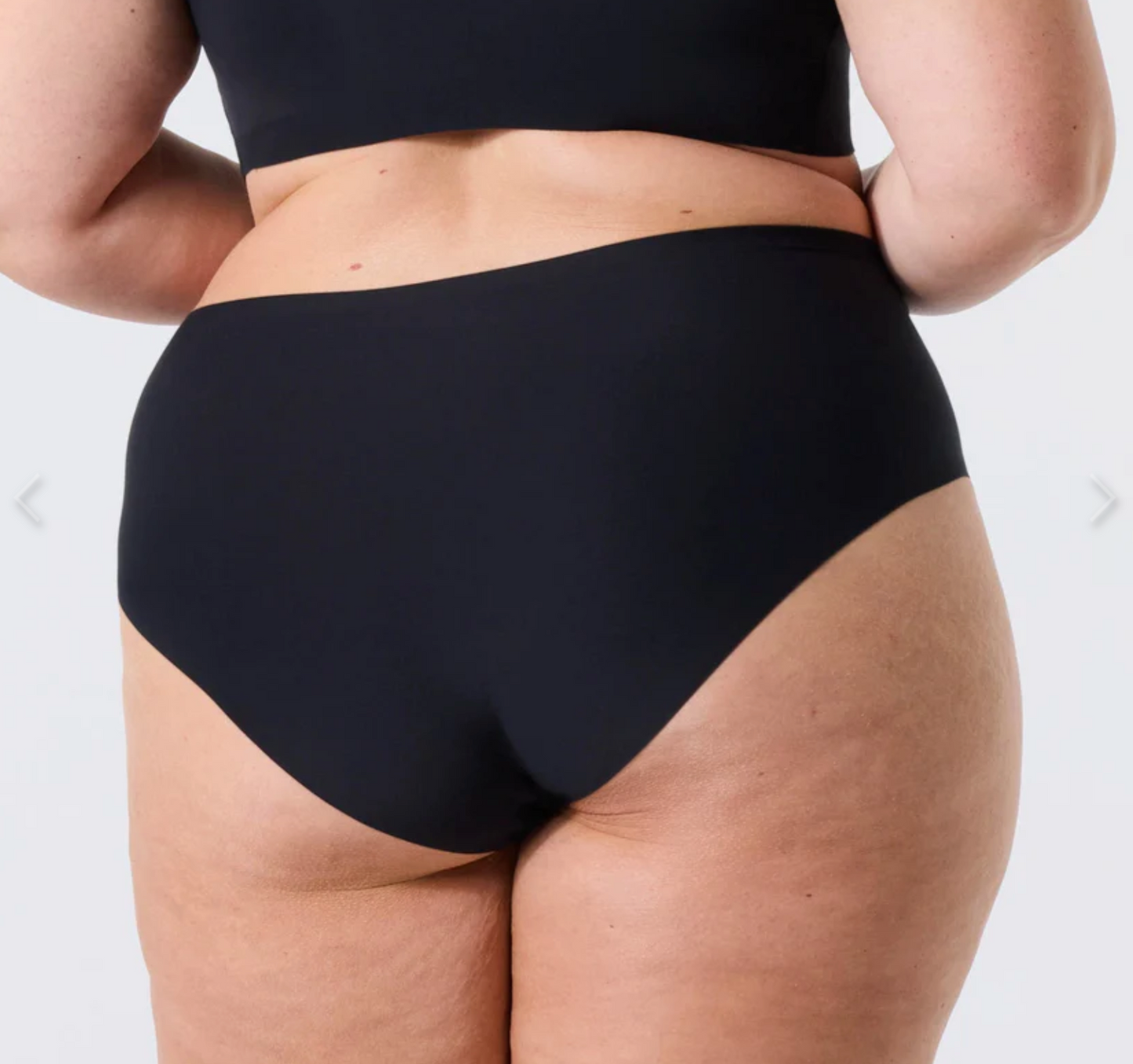 WOMAN IN BLACK PANTY