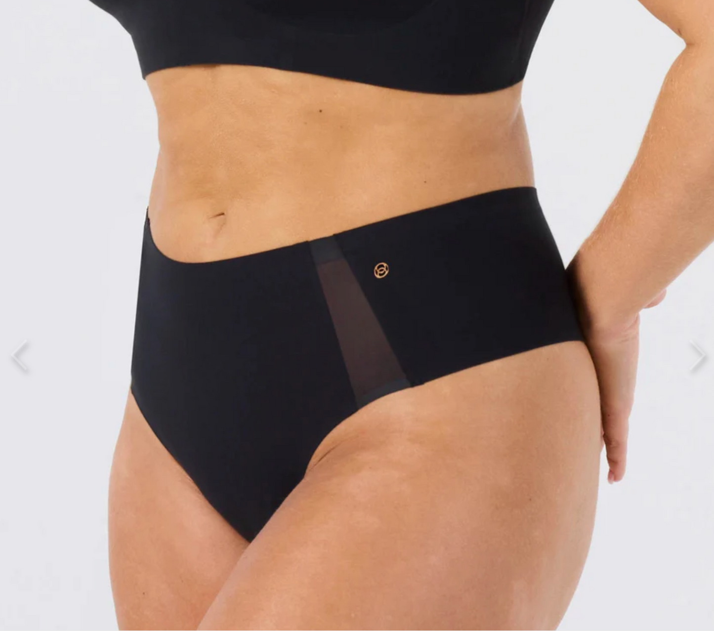 WOMAN IN BLACK THONG