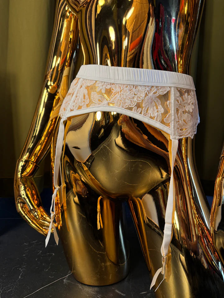 mannequin in white embroidery garter set