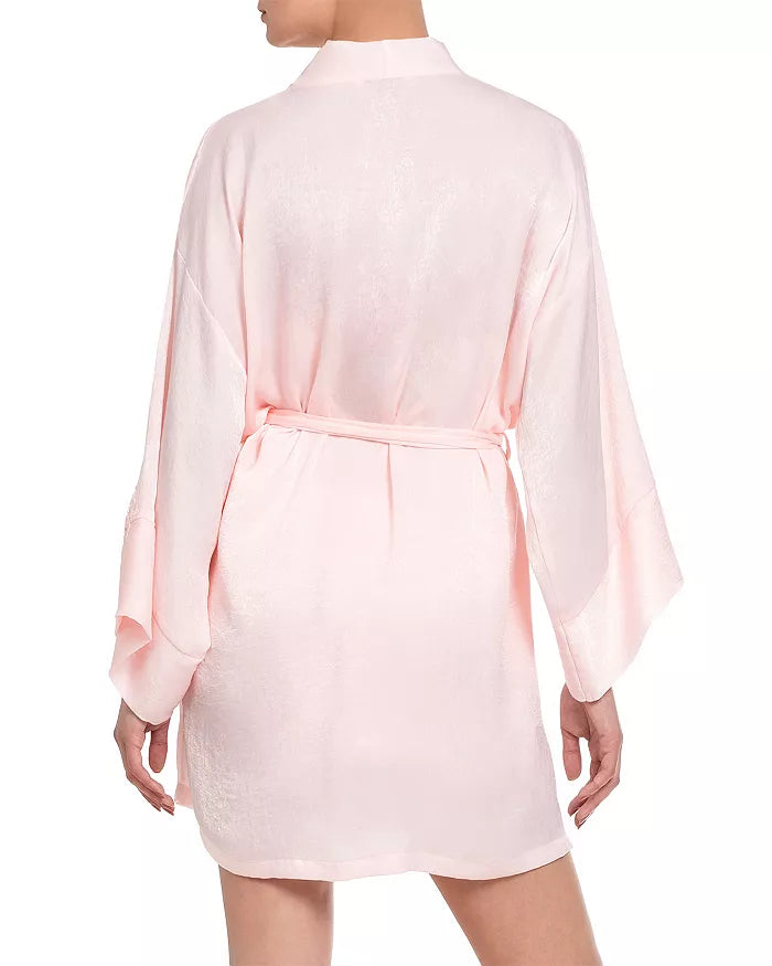 woman in pink satin robe