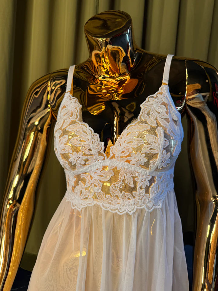mannequin in white embroidery babydoll dress