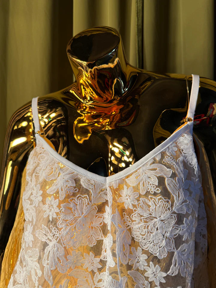 mannequin in white embroidery slip