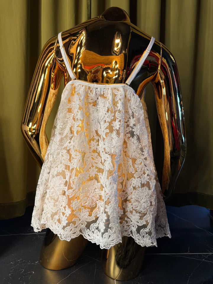 mannequin in white embroidery slip