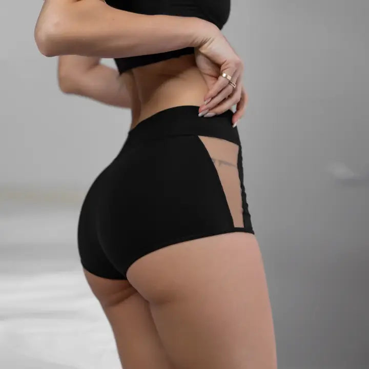 woman in black short set