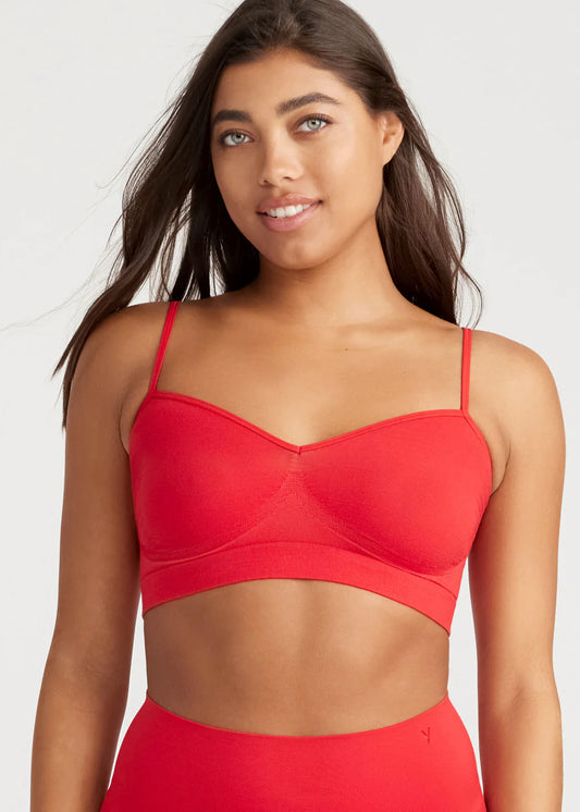 WOMAN IN RED BRALETTE