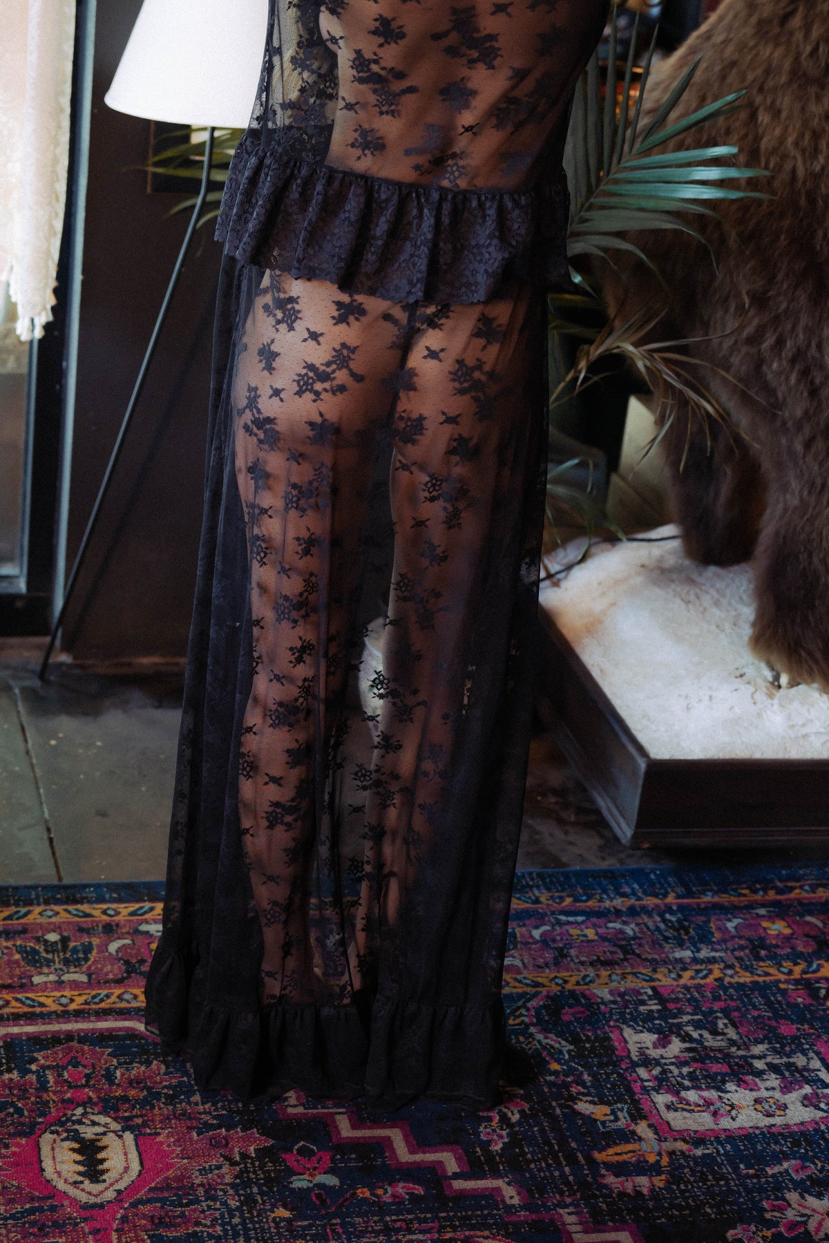 WOMAN IN BLACK LACE MAXI ROBE
