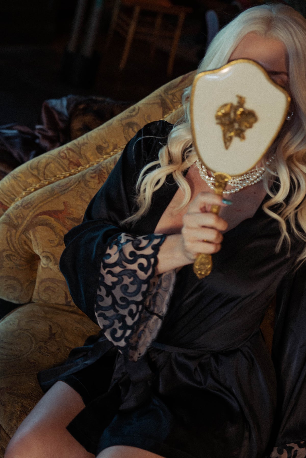 WOMAN WEARING EMBROIDERY-LASER CUT LEATHER SHORT ROBE