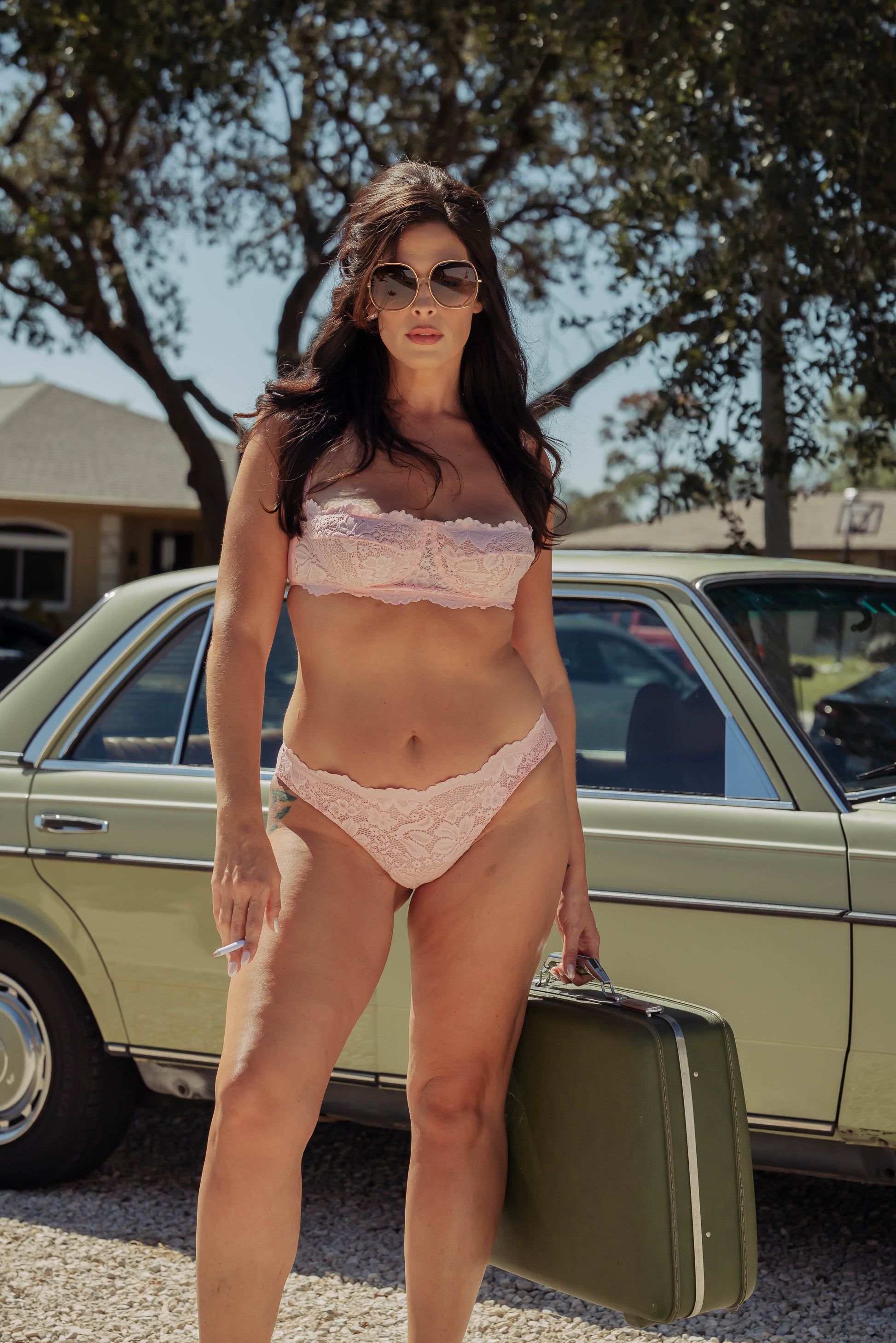 WOMAN IN PINK LACE BRA AND PANTY SET