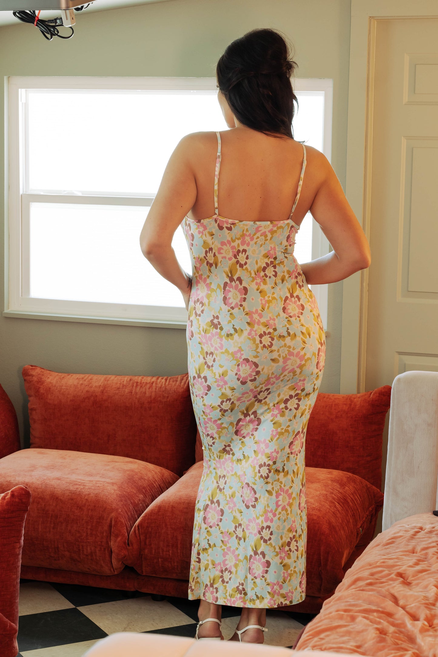Woman in floral print maxi slip