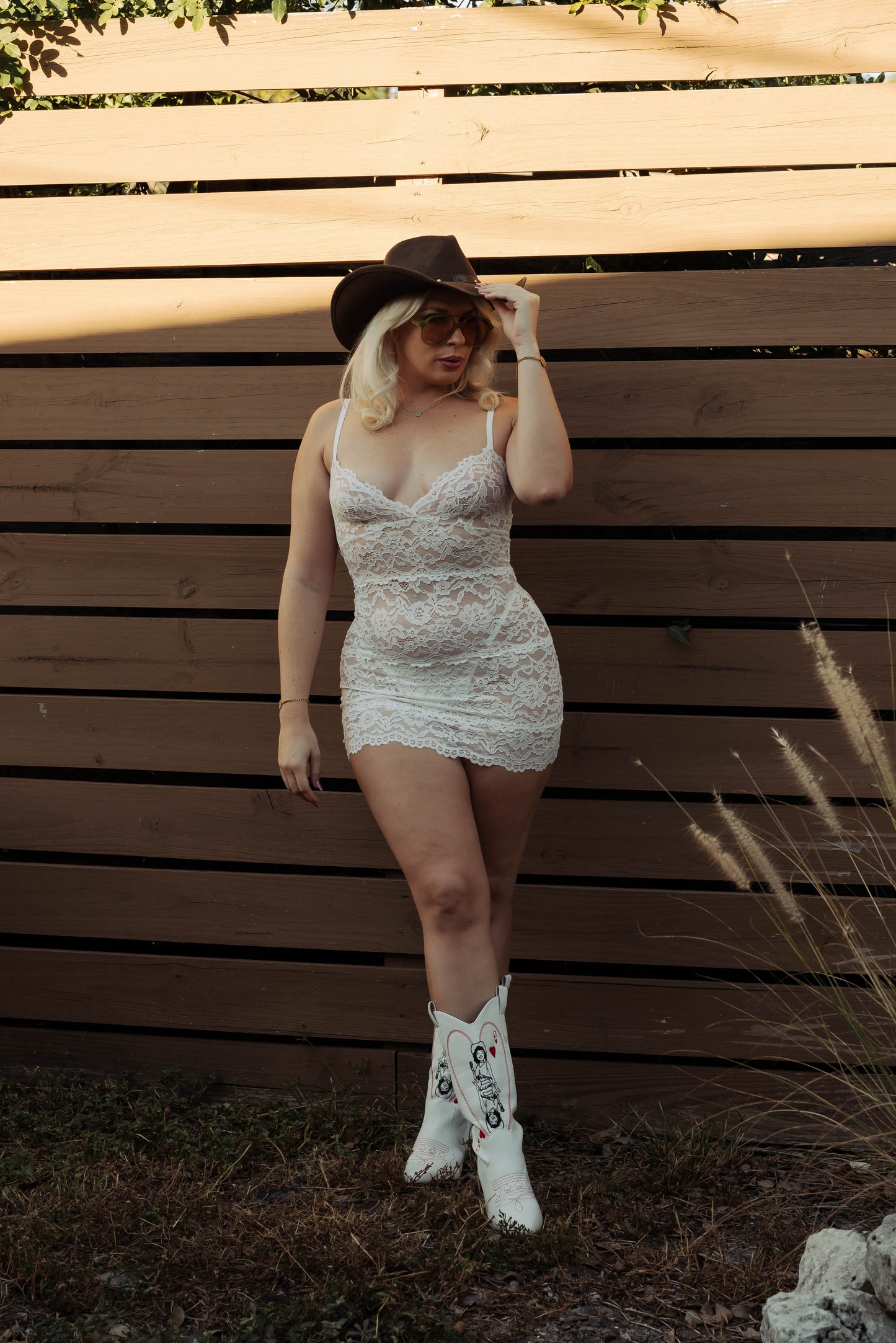 WOMAN IN WHITE LACE MINI SLIP DRESS