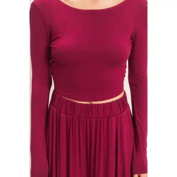 WOMAN MODELING LONG SLEEVE AND WIDE LEG PANT SET IN BURGUNDY