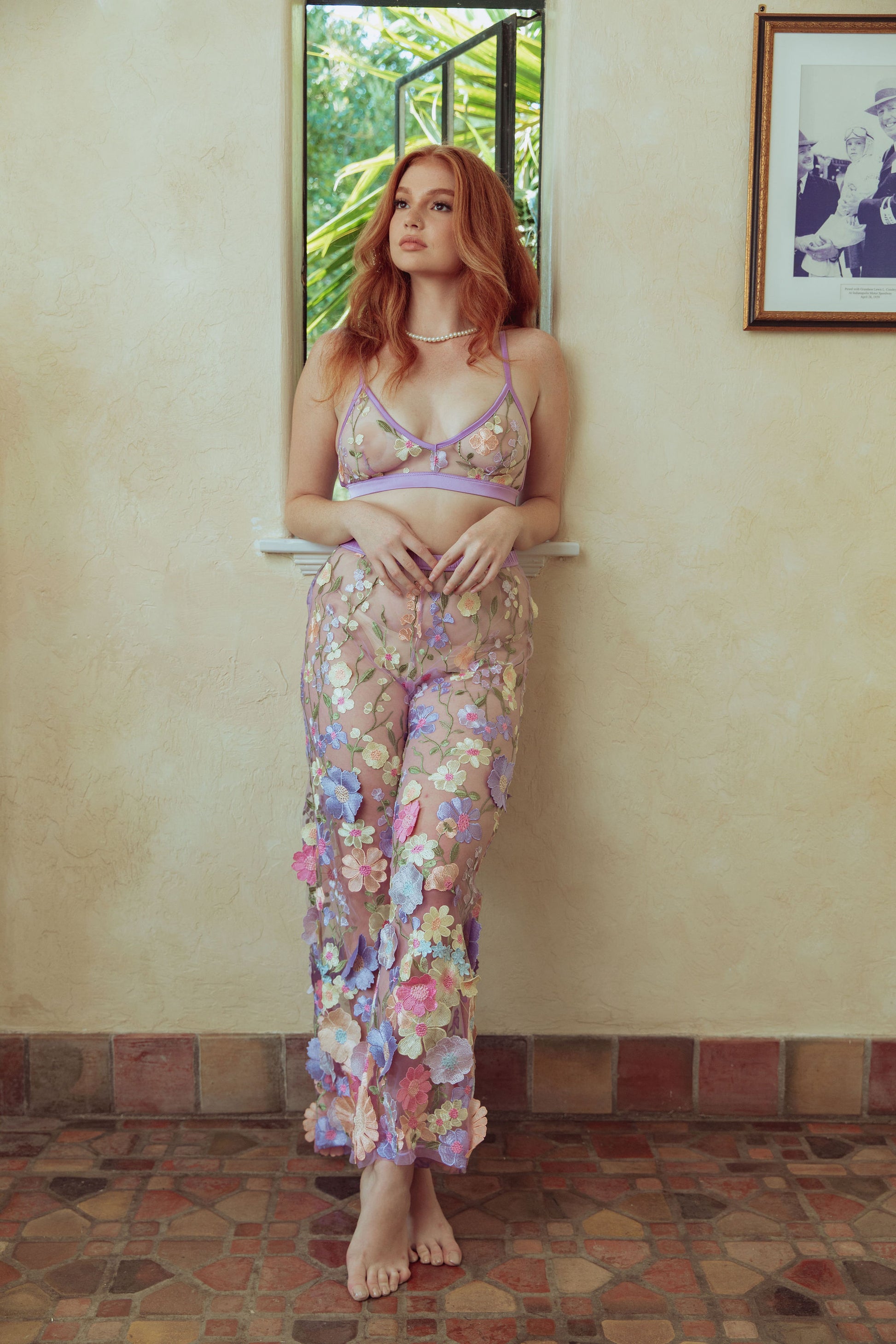 woman in floral pants