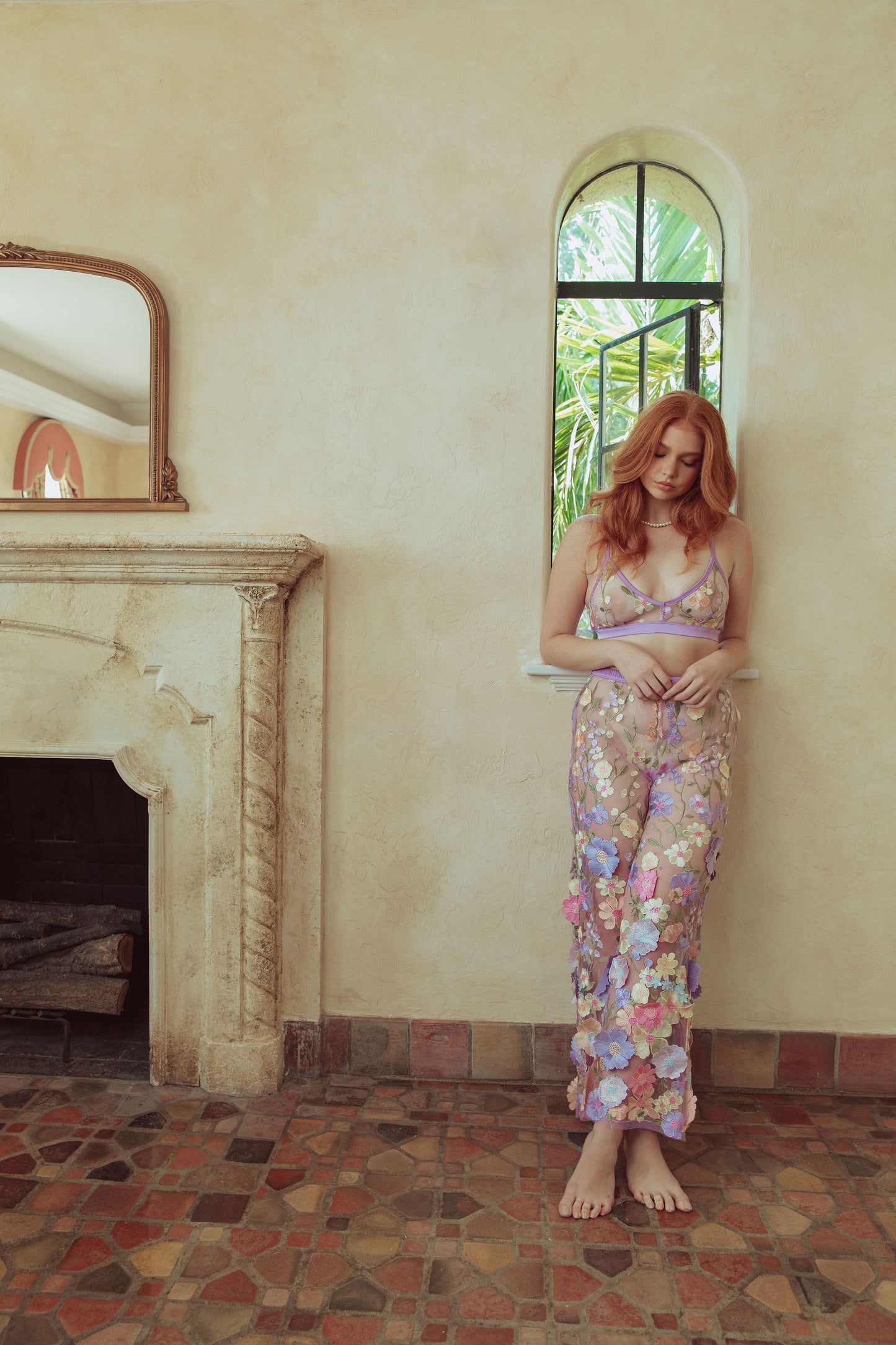 woman in floral pants