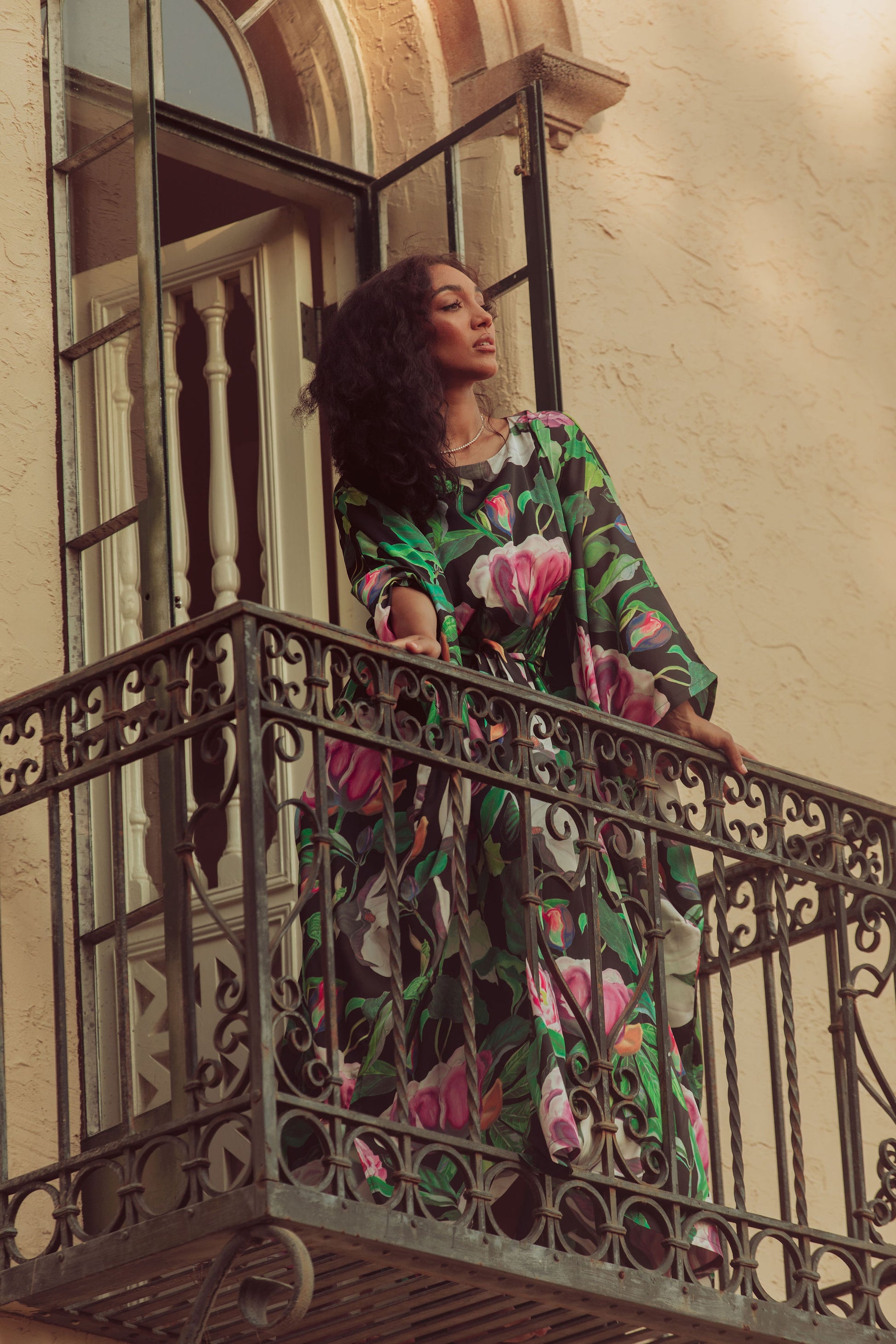 woman in floral caftan