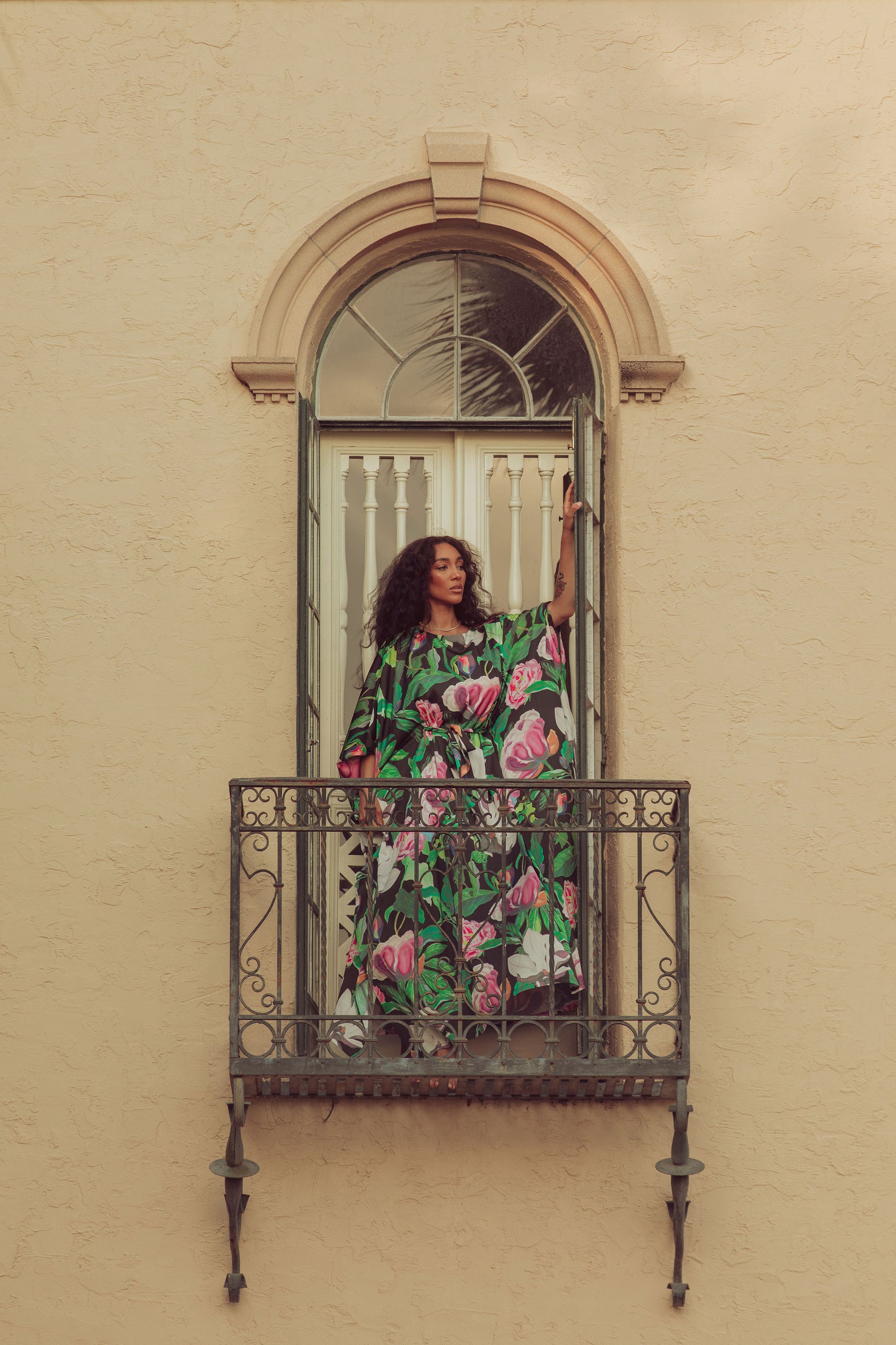 woman in floral caftan