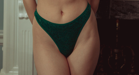 WOMAN IN GREEN LINGERIE