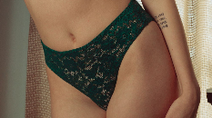 WOMAN IN GREEN LINGERIE