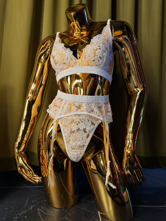 mannequin in white embroidery garter set