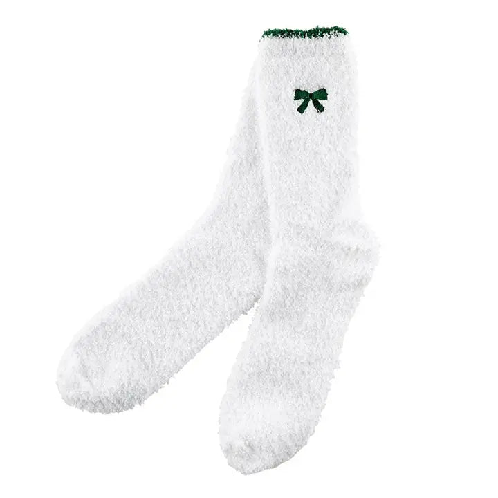 white fluffy socks with green bow