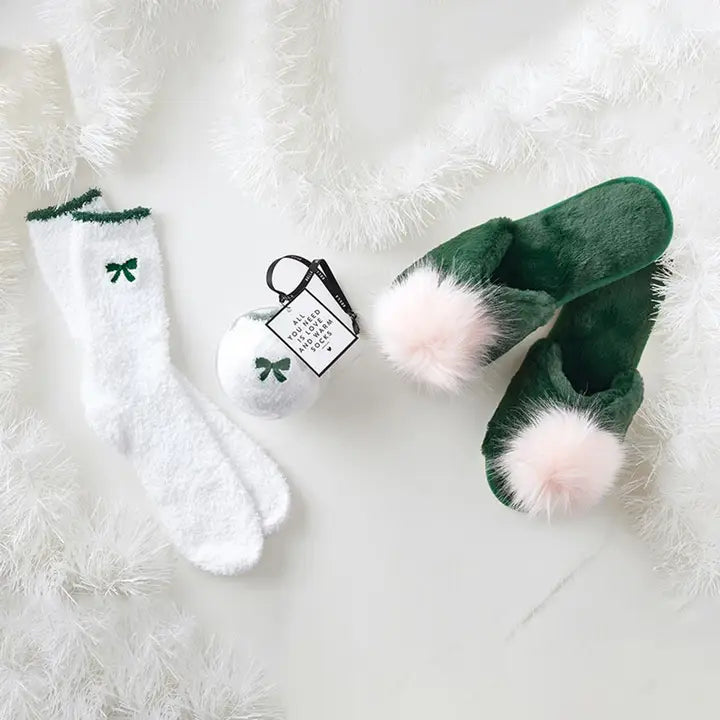 white fluffy socks with green bow