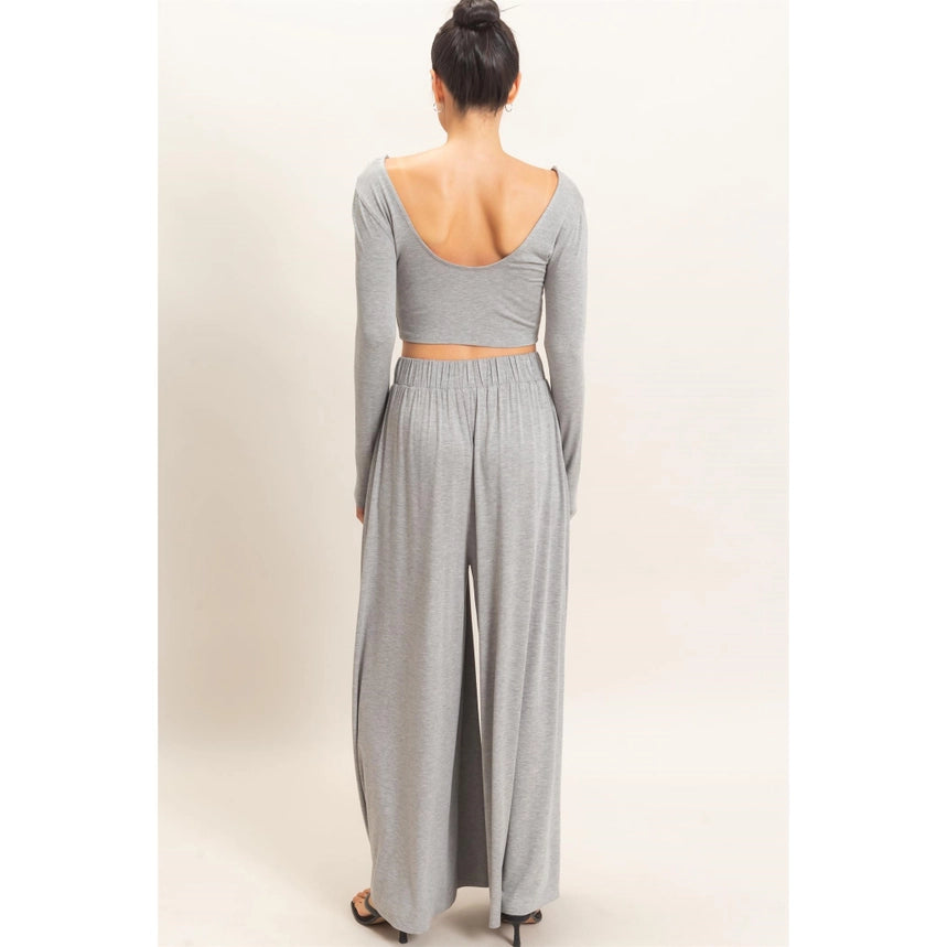 WOMAN MODELING LONG SLEEVE AND WIDE LEG PANT SET IN GRAY