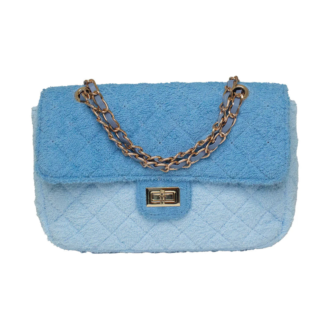 Blue cotton textured handbag with a gold hardware