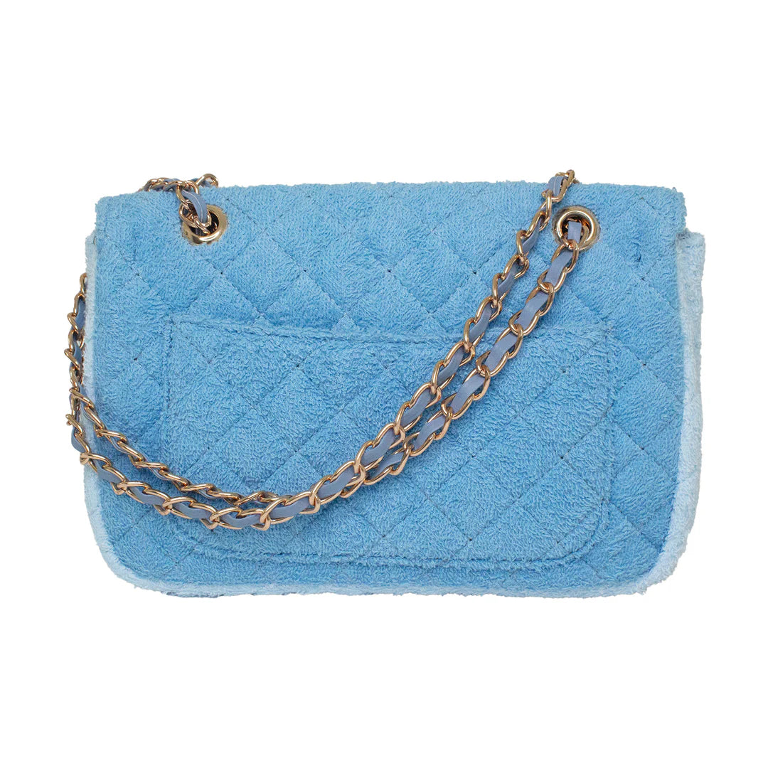 Blue cotton textured handbag with a gold hardware