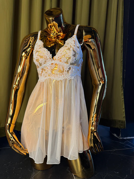 mannequin in white embroidery babydoll dress
